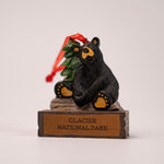 Bearfoots Bart Welcomes You Magnetic Glacier National Park Ornament by Jeff Fleming