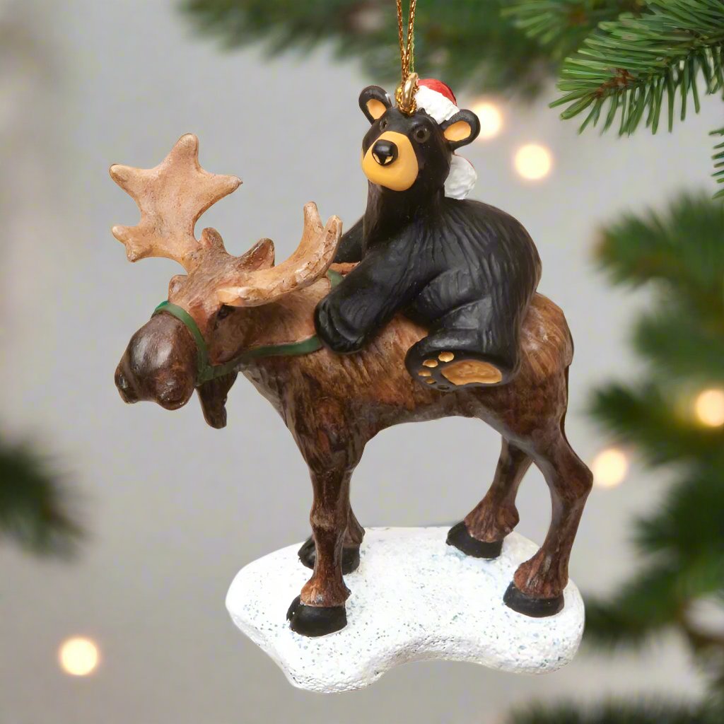 Celebrate the Holidays with a native Montanan, Jeff Fleming, and his cute Bearfoootos Bear Riding Moose Ornament. 