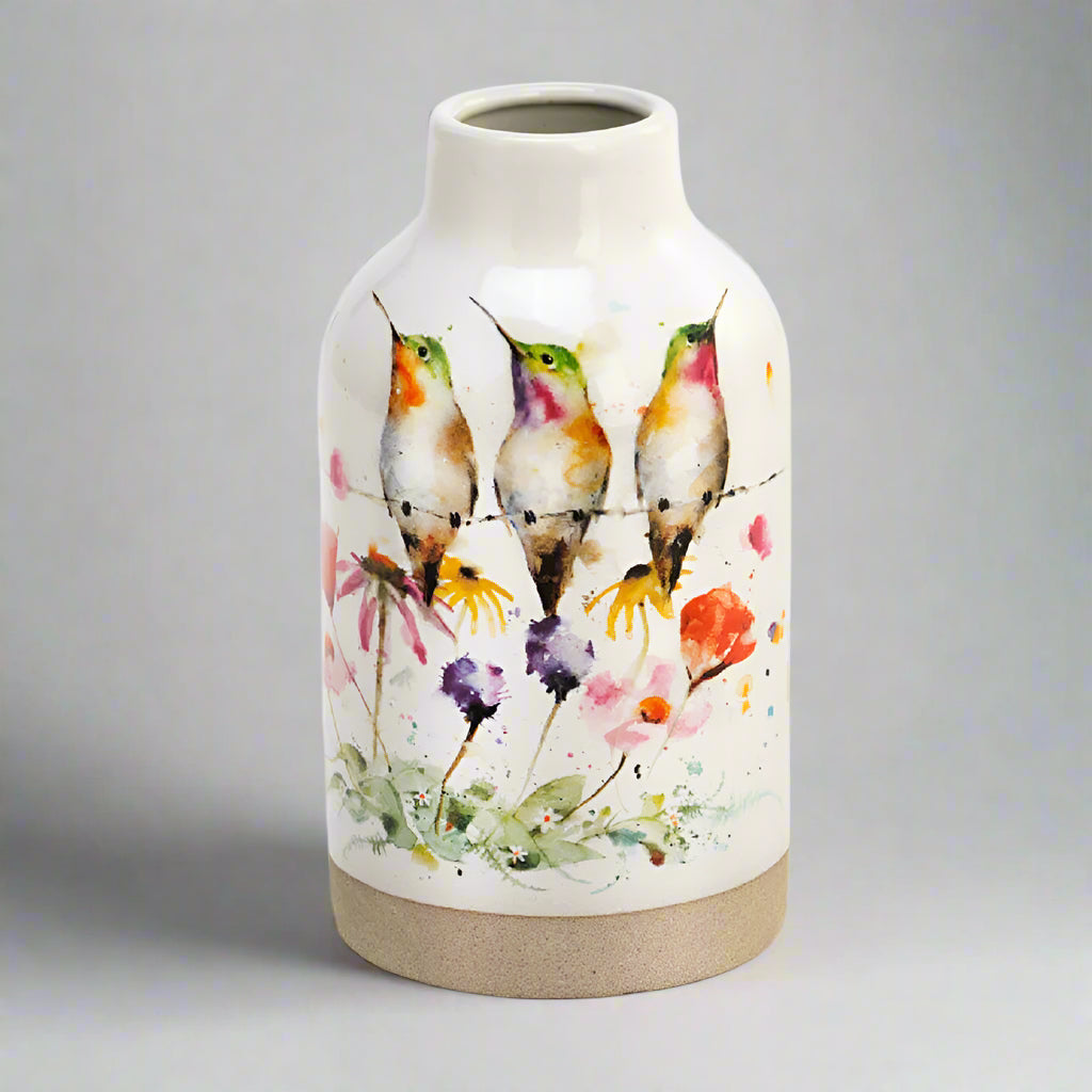 Dean Crouser Wildflower Friends PeeWee Collection Vase by Demdaco stoneware vase is adorned with two hummingbirds amongst a blooming garden of wildflowers