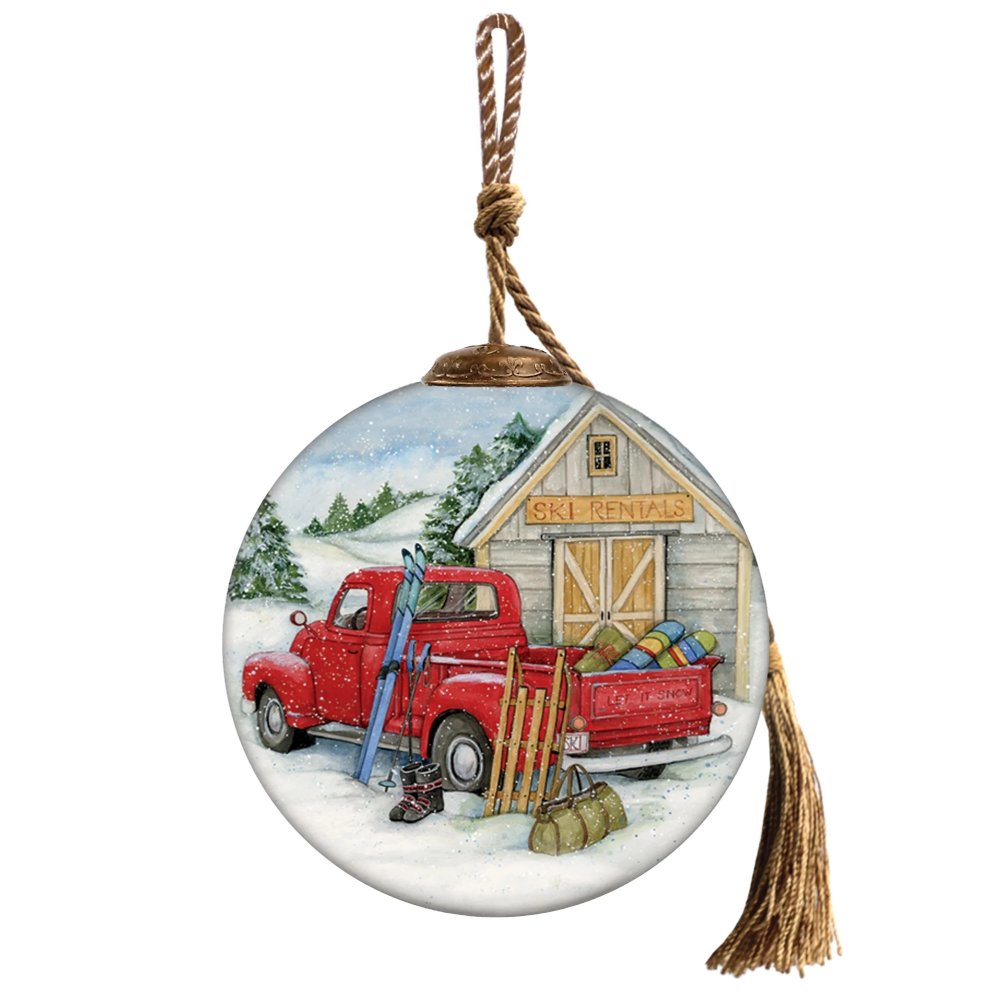 The weather may be frightful, but the Christmas vibes are delightful when you have the Susan Winget Ski Rentals Ornament by Inner Beauty hanging on your tree. 